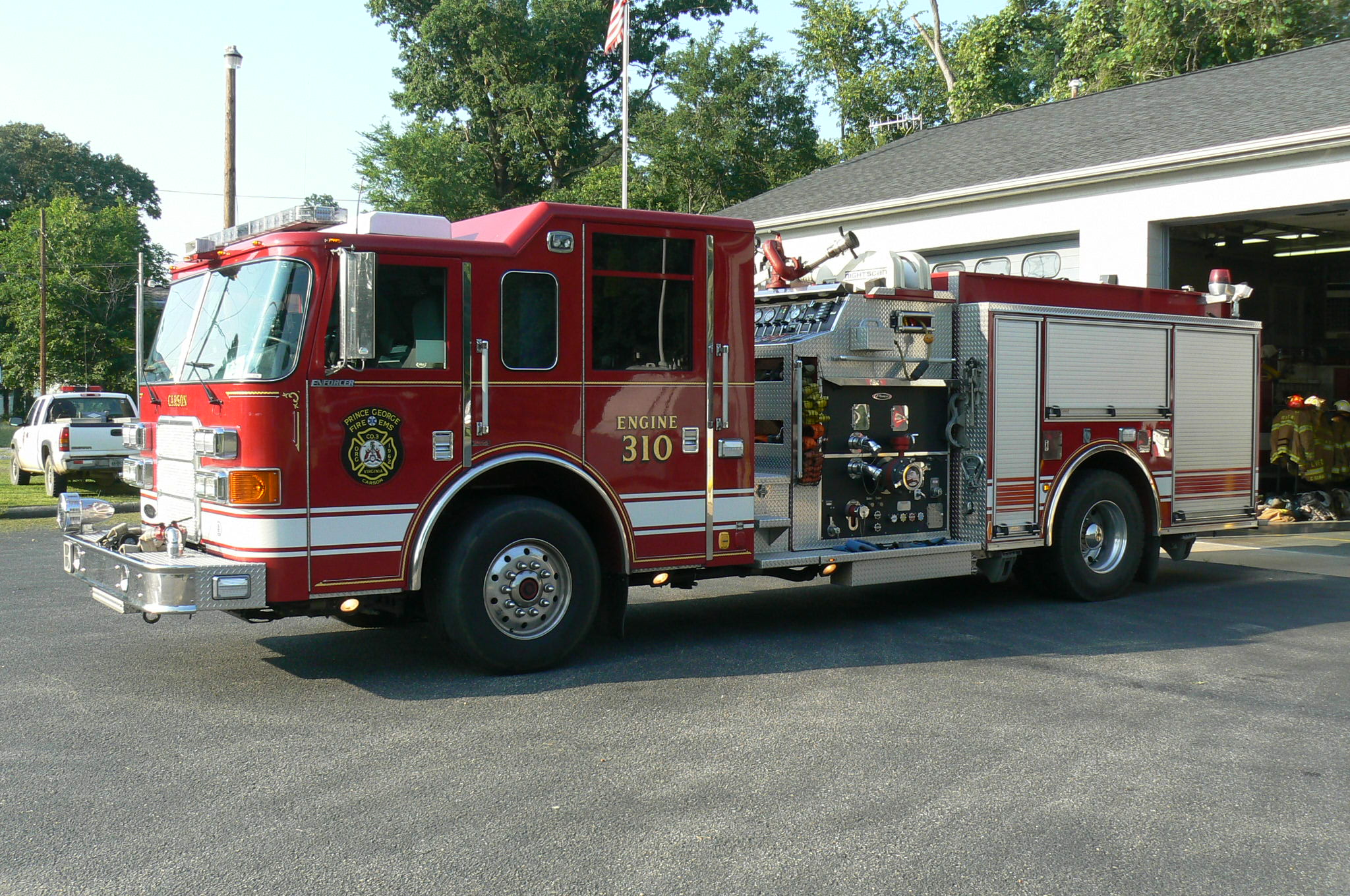 Red fire engine in driveway